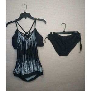 Black and white 2 PC bathing suit with Open sides and strappy back size Large